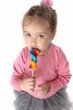little girl with big lollipop