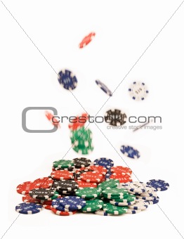 Bunch of falling casino chips on white