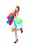 happy asian young woman with shopping bags