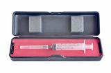 Medical disposable syringe in case 