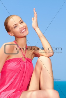 Fashion woman posing next to pool