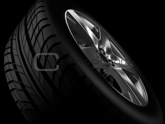 Background closeup automotive wheel with alloy metallic rim