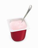 Single-serving pot of strawberry yogurt with spoon