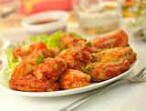 hot chicken wings with salad