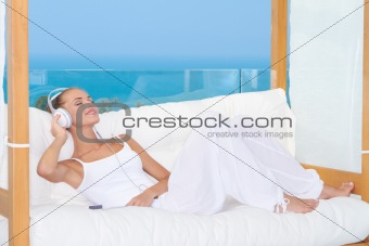 Dreaming woman listening to music