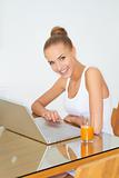 Healthy woman using laptop