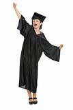 Happy student woman rejoicing graduation isolated