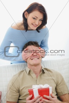 Girl making surprise to boyfriend