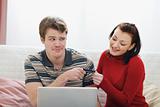 Young man afraid to give credit card to girlfriend