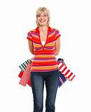Happy older woman with shopping bags