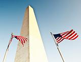 Two U.S. Flags Under Washington Monument