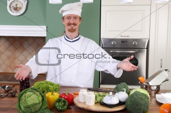 Young chef preparing lunch in kitchen