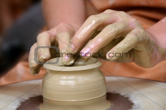 Clay pot on the wheel