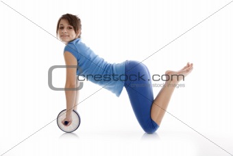 Girl with a gymnastic roller
