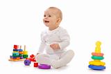 Baby play with toys on white background in studio