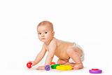 Baby play with toys on white background in studio
