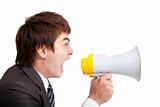young Businessman screaming by megaphone
