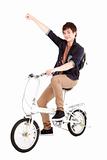 Happy asian young man on a bicycle isolated on white background