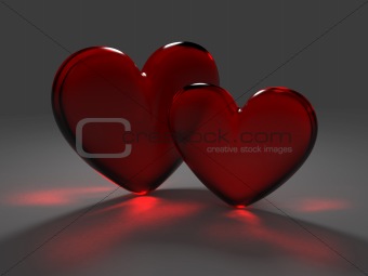 Two red hearts from frosted glass with caustic effect