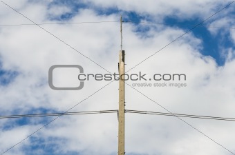 Electricity post and blue sky