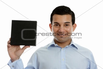 Salesman holding a product, book or other merchandise