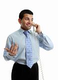 Businessman in discussion on telephone