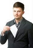 Young businessman taking blank paper out of pocket