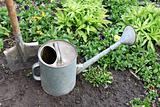 shovel and watering can