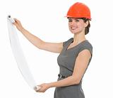 Smiling architect woman with open flip chart isolated