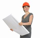 Portrait of dreaming architect woman with open flip chart isolated