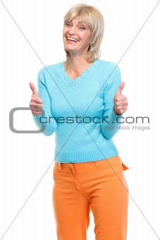 Middle age woman showing thumbs up
