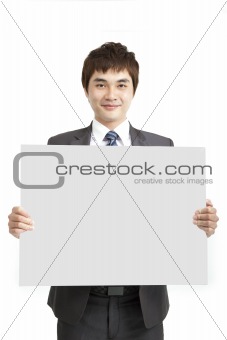smiling asian business man holding empty board