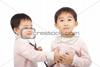 two boys using stethoscope Check the heartbeat