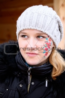 young girl in a hat with a picture on your face