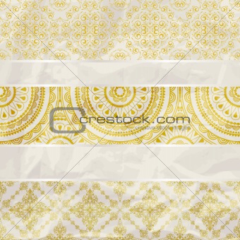vector seamless floral borders on  crumpled golden foil  paper t