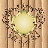 patterned frame with parchment on wooden background