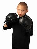 A young boy is ready to fight.