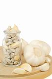 Garlic and herbal supplement pills isolated, alternative medicine concept