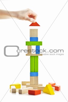 Wooden block tower under construction