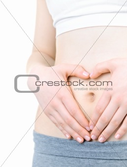Heart shaped hands on tummy