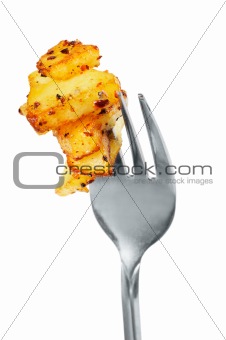 Fried potatoes  on  a fork