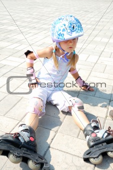 child on in-line rollerblade skate