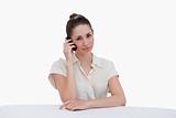 Cute businesswoman making a phone call