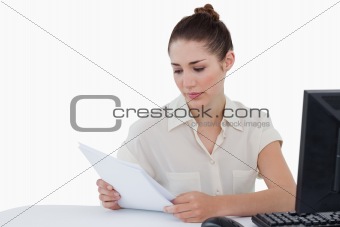 Businesswoman looking a document