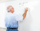 Stock Photo of Teacher or Adult Student at Blackboard