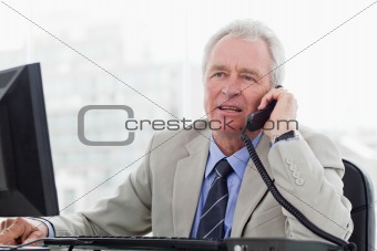 Senior manager on the phone