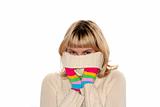 blond girl in Multi-coloured gloves is trying to hide
