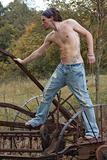 Shirtless male in jeans