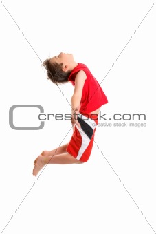 boy jumpging arms outstretched