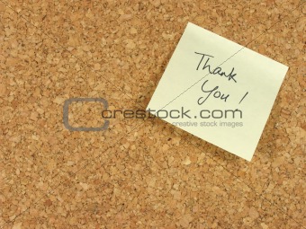 Thank you note on corkboard